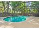 Inviting pool area enclosed with screen, features a sun-drenched deck perfect for lounging and relaxation at 2285 Hidden Meadows E Dr, Palm Harbor, FL 34683