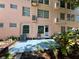 Ground floor back patio with seating at 2457 Ecuadorian Way # 27, Clearwater, FL 33763