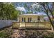 A charming backyard deck is perfect for entertaining with direct access into the house at 2710 10Th N St, St Petersburg, FL 33702