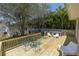 A large backyard deck has ample seating and space for entertaining at 2710 10Th N St, St Petersburg, FL 33702