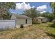 Spacious backyard featuring a deck and a detached garage at 2710 10Th N St, St Petersburg, FL 33702