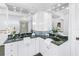 Bathroom with double sinks, granite counters, and lots of storage space at 2710 10Th N St, St Petersburg, FL 33702
