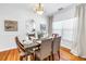 Bright dining room featuring hardwood floors, a chandelier, and a set dining table at 2710 10Th N St, St Petersburg, FL 33702