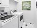 Convenient laundry room with modern washer and dryer units at 2710 10Th N St, St Petersburg, FL 33702