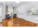 Bright living room with hardwood floors, comfortable armchairs and a view into other rooms at 2710 10Th N St, St Petersburg, FL 33702