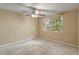 A bedroom view with a large window showcasing green foliage at 3559 Rock Royal Dr, Holiday, FL 34691