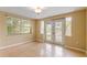 Bright living space with large windows and glass doors that provide lots of natural light at 3559 Rock Royal Dr, Holiday, FL 34691
