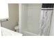 Bathroom featuring modern fixtures including a shower with white tile and a stylish shower curtain at 38535 Clinton Ave, Dade City, FL 33525