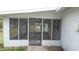 Enclosed screened porch offers a versatile space for enjoying the outdoors while staying protected at 38535 Clinton Ave, Dade City, FL 33525