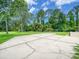 Large driveway offers ample parking and leads to the home at 3910 Saywood Ct, Palm Harbor, FL 34685