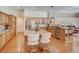 Spacious kitchen with stainless steel appliances, granite countertops, and a central island with seating at 3910 Saywood Ct, Palm Harbor, FL 34685