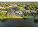 Aerial view of the property highlighting its proximity to the lake at 3925 Dunaire Dr, Valrico, FL 33596