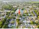 Aerial view of the property with the lake in the background at 3925 Dunaire Dr, Valrico, FL 33596