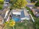 Aerial view of the property showing the screened-in pool and surrounding yard at 3925 Dunaire Dr, Valrico, FL 33596