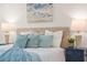Close up of the bed in the bedroom with neutral decor and stylish bedside tables at 3925 Dunaire Dr, Valrico, FL 33596