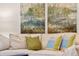 Living room features modern decor and comfortable sofa and pillows at 3925 Dunaire Dr, Valrico, FL 33596