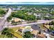 An aerial view displaying houses in a community near local shops, parks, and roads at 4307 Shadberry Dr, Tampa, FL 33624