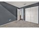 Clean bedroom features soft carpet flooring, and a large closet at 4307 Shadberry Dr, Tampa, FL 33624
