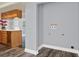 The laundry room area has wood-look floors, and hookups for a washer and dryer at 4307 Shadberry Dr, Tampa, FL 33624