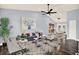 A spacious living room featuring hardwood floors, high ceilings, and an abundance of natural light at 4307 Shadberry Dr, Tampa, FL 33624