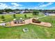Aerial view of community playground featuring slides, climbing structures, and picnic area at 4307 Shadberry Dr, Tampa, FL 33624