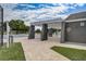 Poolside lounge area with shaded seating and an outdoor shower for residents to enjoy at 4307 Shadberry Dr, Tampa, FL 33624