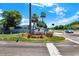 A sign for 'The Plantation at Carrollwood' surrounded by a well manicured traffic circle at 4307 Shadberry Dr, Tampa, FL 33624