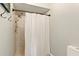 Standing shower in a bathroom with an adjustable shower head at 4419 Longshore Dr, Land O Lakes, FL 34639