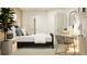 This bedroom features a cozy bed with decorative pillows, a study space, and ample closet space at 4511 S Manhattan Ave # 3, Tampa, FL 33611