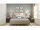 A modern bedroom featuring dinosaur wall art, soft lighting, and a cozy, inviting atmosphere at 4511 S Manhattan Ave # 3, Tampa, FL 33611