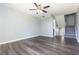 A spacious living room featuring dark wood floors and a staircase to the second level at 4517 La Capri Ct, Tampa, FL 33611