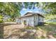Angle view of house from the backyard with trees at 4804 N 18Th St, Tampa, FL 33610