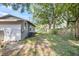 Backyard with grass and a weathered wooden fence around the perimeter at 4804 N 18Th St, Tampa, FL 33610