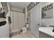 Well maintained bathroom featuring checkered wall decor and modern fixtures at 5057 Ivory Stone Dr, Wimauma, FL 33598