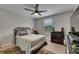 Bedroom featuring an area rug and a window with a view to the outside at 5057 Ivory Stone Dr, Wimauma, FL 33598