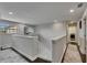 Bright upper landing area with plush carpets, lots of light, and a view to the outside at 5057 Ivory Stone Dr, Wimauma, FL 33598