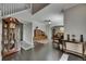 Open-concept living area featuring hardwood floors and views into the dining room at 5057 Ivory Stone Dr, Wimauma, FL 33598