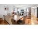 Modern kitchen with stainless steel appliances, sleek countertops, and an adjacent dining area at 5149 4Th St, Zephyrhills, FL 33542