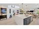 Modern kitchen with a large island, pendant lighting, and open layout ideal for entertaining at 540 Gulf Bay Rd, Longboat Key, FL 34228