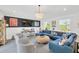 Comfortable living room with cozy seating, TV, and stylish decor at 540 Gulf Bay Rd, Longboat Key, FL 34228