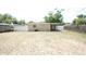 Expansive backyard with a privacy fence surrounding it, offering plenty of space for recreation and outdoor activities at 5417 Golden Dr, Tampa, FL 33634