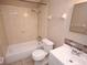Bathroom with shower-tub combo, neutral paint, tile flooring and vanity at 5417 Golden Dr, Tampa, FL 33634