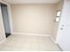 Entry room with window, tile flooring and neutral paint at 5417 Golden Dr, Tampa, FL 33634
