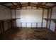Interior view of storage shed with wooden supports, a workbench, and a pegboard at 5417 Golden Dr, Tampa, FL 33634