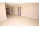 Open living room with tiled floors, offering a clean and bright space at 5417 Golden Dr, Tampa, FL 33634