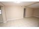 An open living room offers lots of natural light and tile floors at 5417 Golden Dr, Tampa, FL 33634