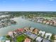 Waterfront community featuring luxurious homes with meticulously landscaped yards, near boating and recreational activities at 6024 Kipps Colony E Dr, Gulfport, FL 33707