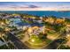 Stunning aerial view of luxury waterfront homes and lush landscaping at twilight with amazing water views at 6024 Kipps Colony E Dr, Gulfport, FL 33707