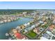Waterfront community featuring beautiful homes, lush landscaping, and easy access to boating and water activities at 6024 Kipps Colony E Dr, Gulfport, FL 33707