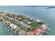 Stunning waterfront homes line the coast, offering gorgeous views and private docks for premier luxury living at 6024 Kipps Colony E Dr, Gulfport, FL 33707